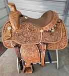 New 15" David Motes Roper With Tooling & Ostrich Seat By Saddlesmith Co.. Fixed Price $3299.99.