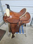 Used 16" Dakota Saddlery Brown Color Hard Tail Slick Seat Roping. Fixed Price $879.99.