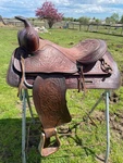 Used/vintage 15" Textan Brahma Western Saddle Made. Fixed Price $125.00.