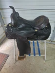 Used 16" Brown Color Hereford Tex Tan Trail Saddle With Some Tooling. Fixed Price $349.99.