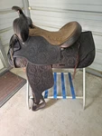 Used 15" Brown Color Hereford Tex Tan Roping Saddle With Tooling All Over It.. Fixed Price $499.99.