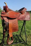 Used 15.5" Hereford Textan Saddle. Fixed Price $450.00.