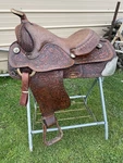 Used/vintage 15" Textan Tooled/buckstitched Western Show Saddle W/silver. Fixed Price $425.00.