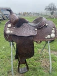 Used/vintage 15" Billy Royal Western Show Saddle W/silver Conchos & Lacing. Fixed Price $545.00.