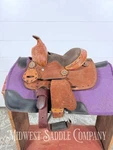 8 Royal King Youth Reno Buckstitch Roughout Pony Barrel Saddle. Fixed Price $240.00.