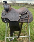 Used/vintage 15" Ryon Buckstitched Western Saddle W/tooled Cutting Horses. Fixed Price $750.00.