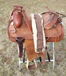 15" Hereford Textan - Western Leather Tooled Saddle W/ Padded Seat. Fixed Price $849.04.
