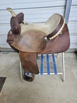 Use Older 16" Brown Color Billy Cook Barrel Saddle W/bear Trap #8042. Fixed Price $749.99.